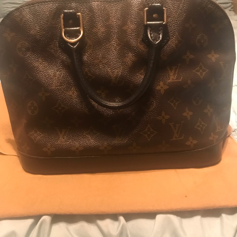 Authentic Louis Vuitton Alma handbag